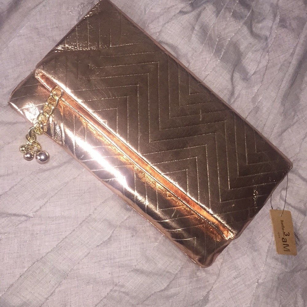 Add some shine with this clutch in hand!